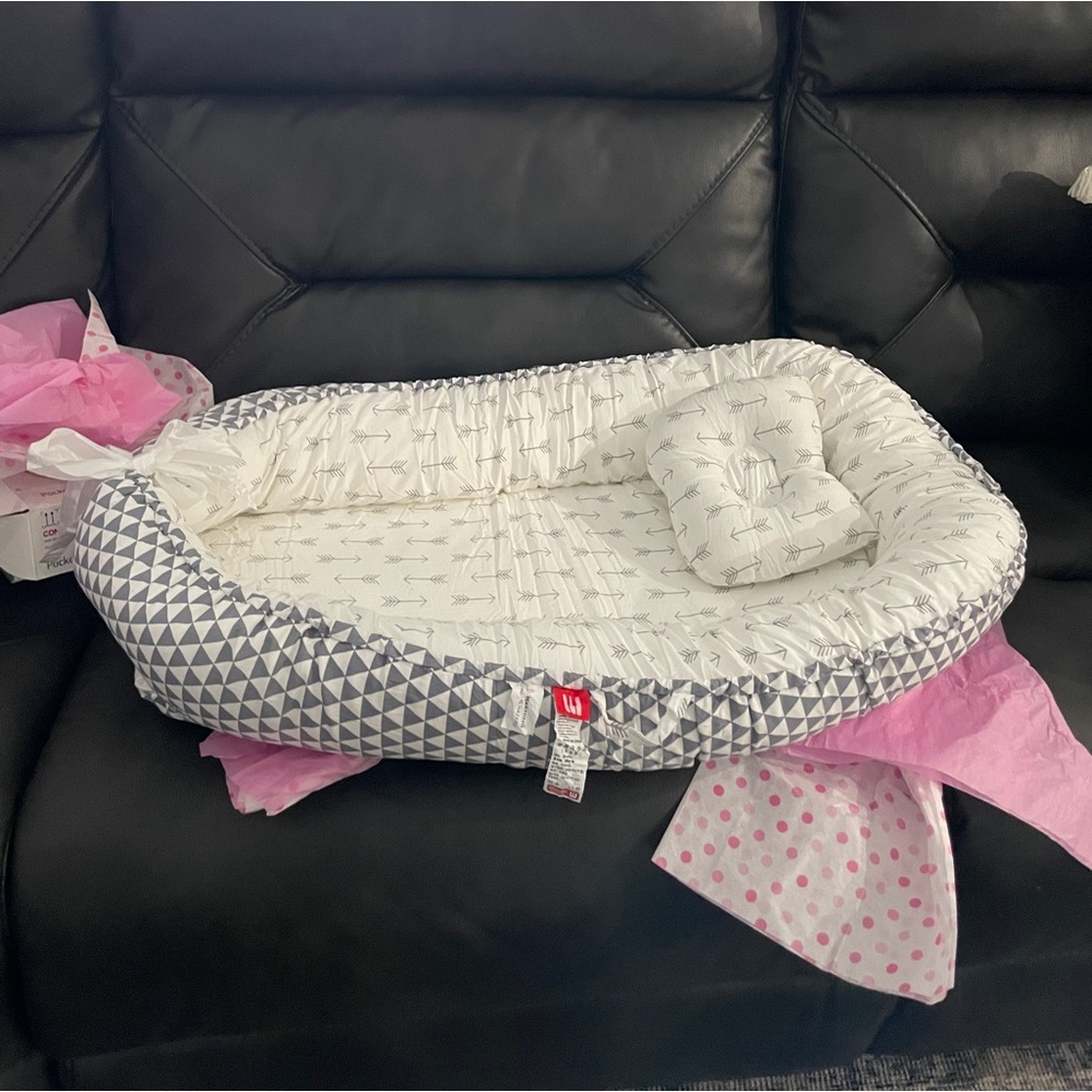 Brand new baby lounger. Got 2 for my baby shower.